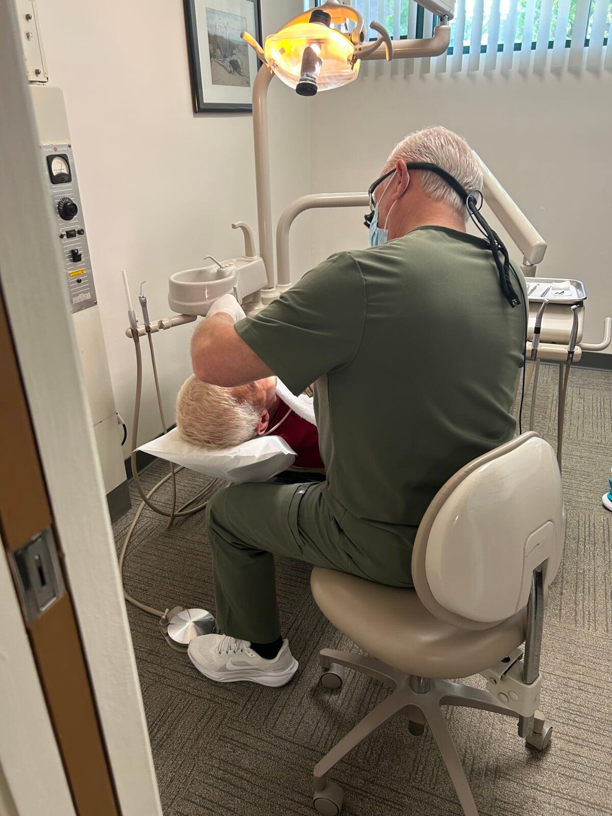 Dr. Steven Rastigue performing dental work